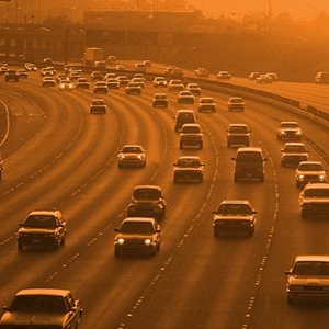 Image of cars on a highway - representing the impact of transportation on air quality.