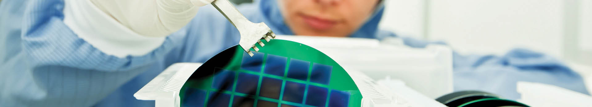 Silicone wafers being put in plastic holders