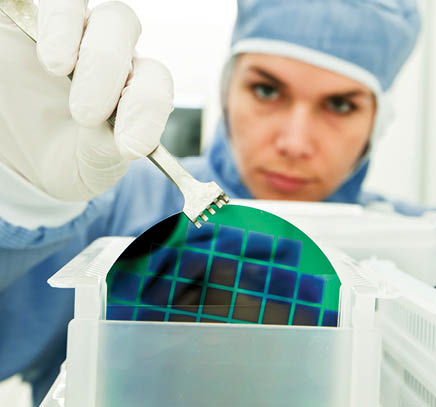 Silicone wafers being put in plastic holders