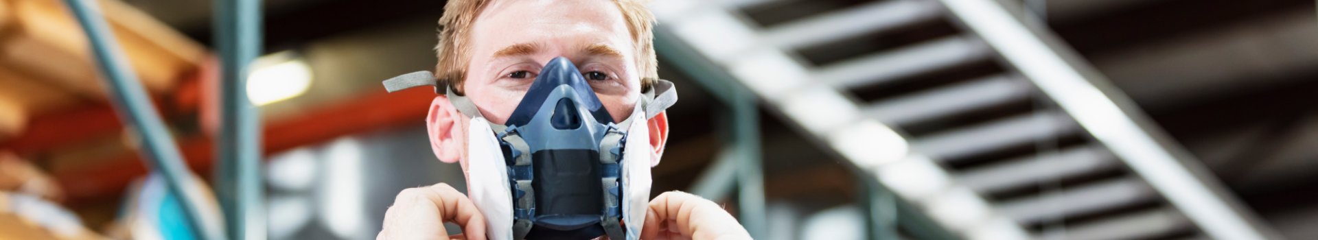 Man wearing half-face respirator